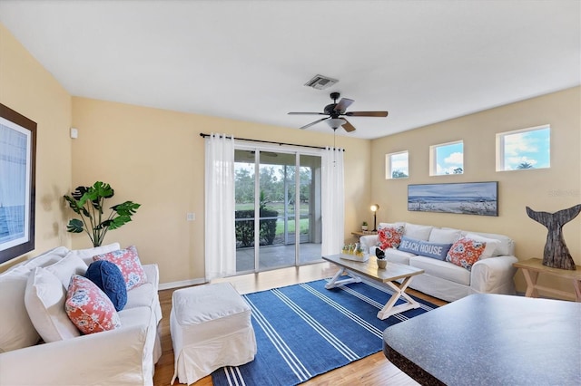 1085 Jonah Dr, North Port, FL 34289 - living room featuring ceiling fan and wood finished floors