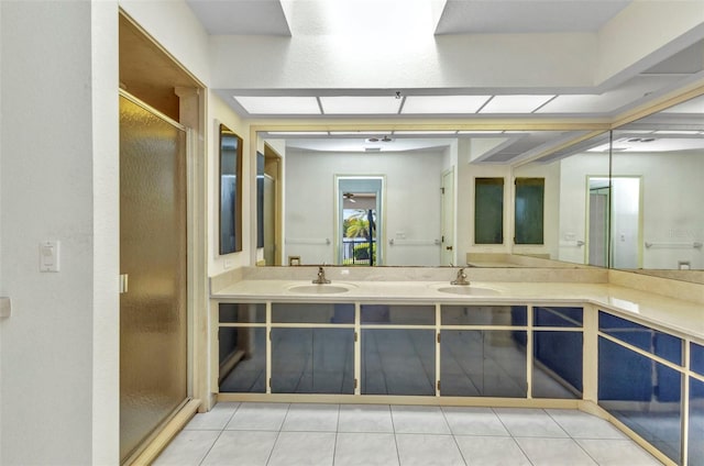 3824 Aves Island Ct, Punta Gorda, FL 33950 - bathroom with a stall shower, double vanity, a sink, and tile patterned flooring
