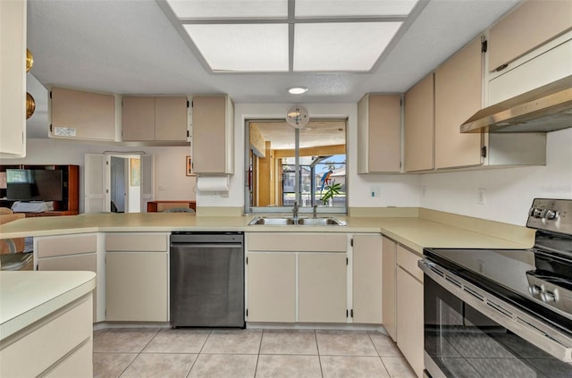 3824 Aves Island Ct, Punta Gorda, FL 33950 - kitchen featuring cream cabinetry, light countertops, under cabinet range hood, and stainless steel electric range
