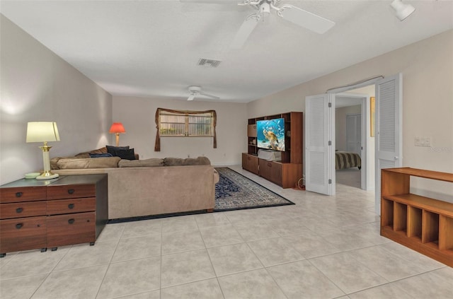 3824 Aves Island Ct, Punta Gorda, FL 33950 - living area with visible vents, a ceiling fan, and light tile patterned flooring