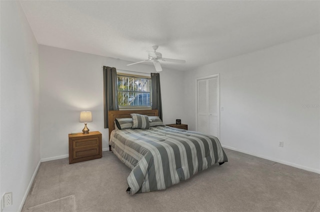 3824 Aves Island Ct, Punta Gorda, FL 33950 - bedroom with a closet, carpet flooring, baseboards, and ceiling fan