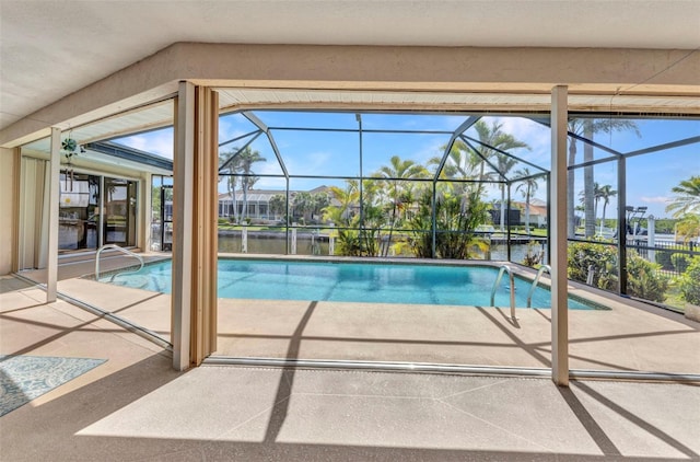 3824 Aves Island Ct, Punta Gorda, FL 33950 - outdoor pool featuring a patio area and glass enclosure