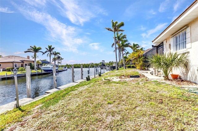 3824 Aves Island Ct, Punta Gorda, FL 33950 - view of yard with a dock and a water view