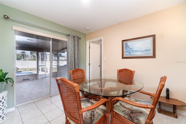 3187 Elkcam Blvd, Port Charlotte, FL 33952 - dining room featuring baseboards and light tile patterned floors