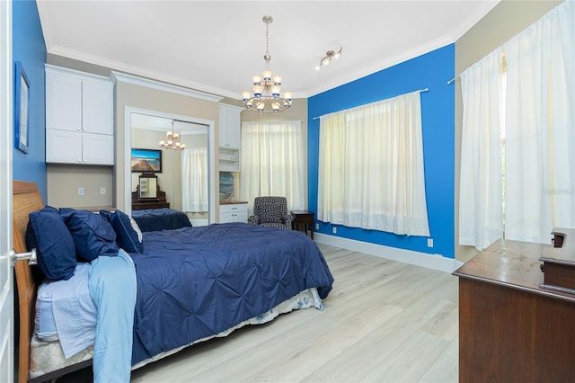bedroom with ornamental molding, a chandelier, light wood-style flooring, and baseboards