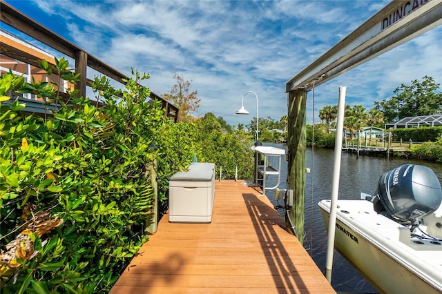 view of dock with a water view