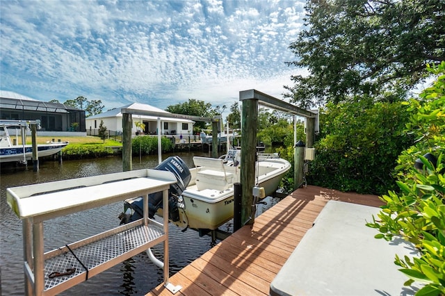 view of dock featuring a water view and boat lift