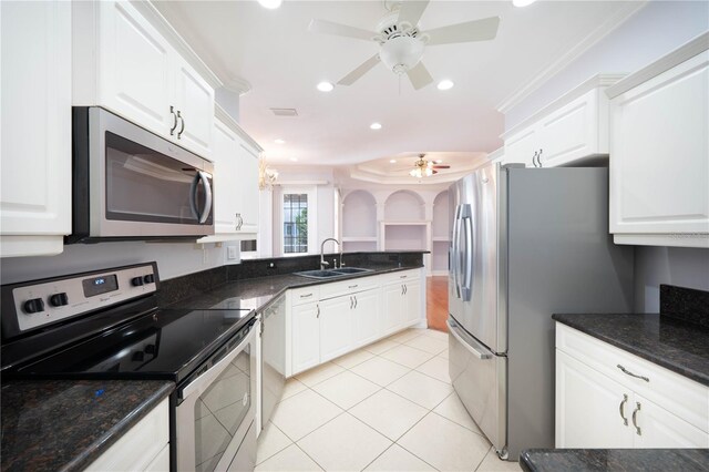 8315 Raoul Ave, North Port, FL 34291 - kitchen featuring appliances with stainless steel finishes, a sink, ceiling fan, white cabinets, and recessed lighting