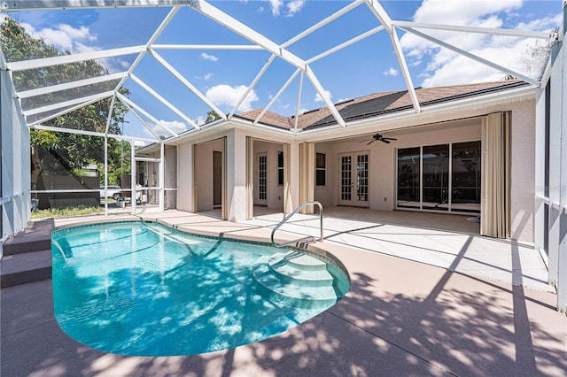 8315 Raoul Ave, North Port, FL 34291 - outdoor pool featuring french doors, a patio area, and a ceiling fan