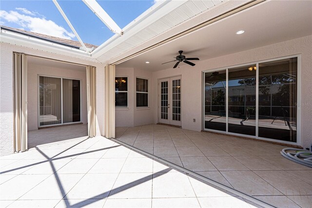 8315 Raoul Ave, North Port, FL 34291 - unfurnished sunroom with a ceiling fan and french doors