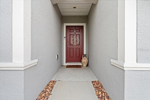 3476 Brewster Rd, North Port, FL 34288 - property entrance with stucco siding