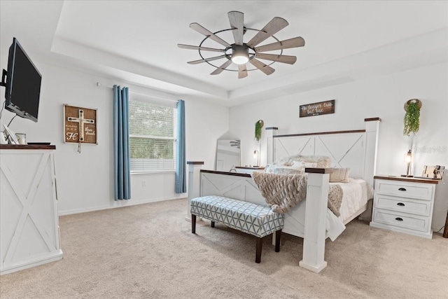 3476 Brewster Rd, North Port, FL 34288 - bedroom with carpet floors, baseboards, a ceiling fan, and a raised ceiling