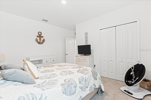 3476 Brewster Rd, North Port, FL 34288 - bedroom with light carpet, visible vents, and a closet
