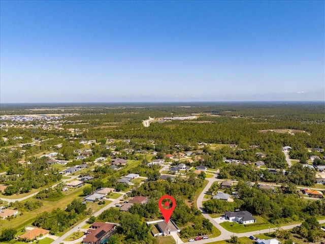 3476 Brewster Rd, North Port, FL 34288 - drone / aerial view featuring a forest view and a residential view