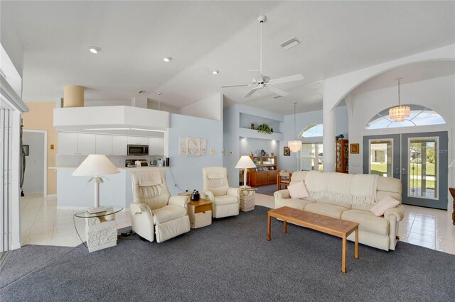 229 Sportsman Rd, Rotonda West, FL 33947 - living room featuring light colored carpet, light tile patterned flooring, french doors, and visible vents