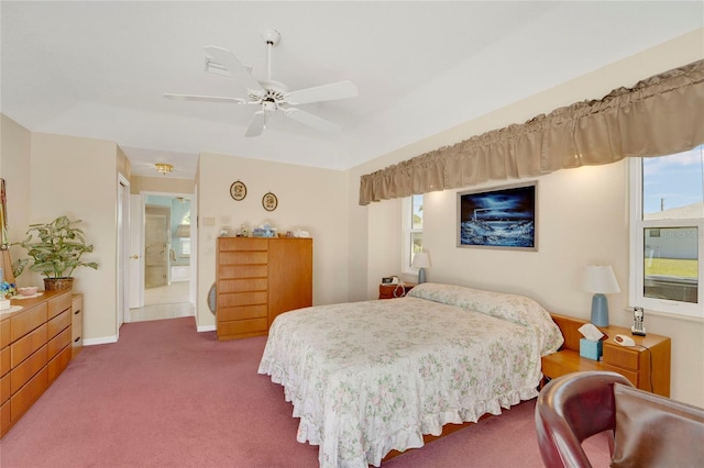 229 Sportsman Rd, Rotonda West, FL 33947 - carpeted bedroom with ceiling fan and multiple windows