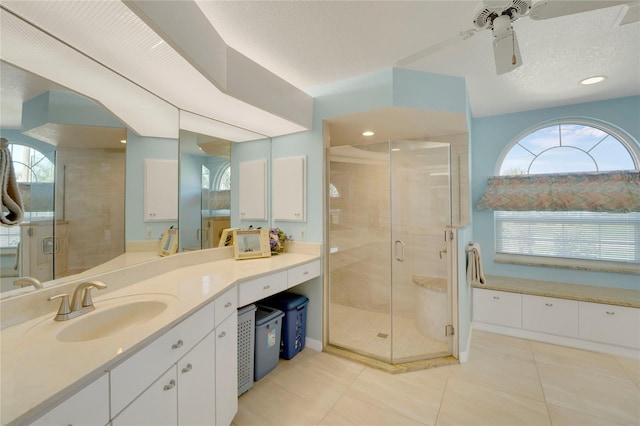 229 Sportsman Rd, Rotonda West, FL 33947 - full bath with recessed lighting, a shower stall, tile patterned flooring, a ceiling fan, and vanity