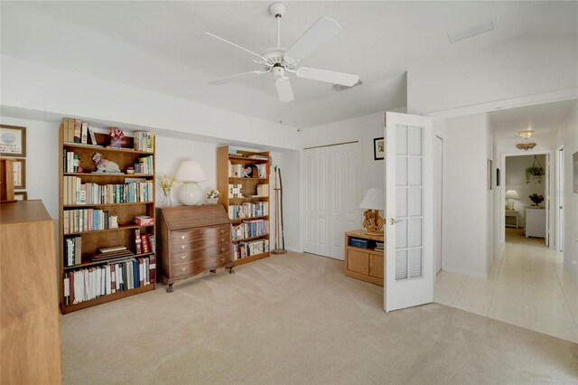 229 Sportsman Rd, Rotonda West, FL 33947 - interior space with light carpet, ceiling fan, and baseboards