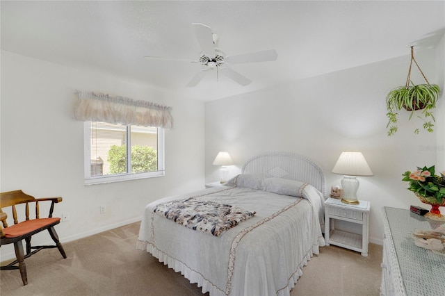 229 Sportsman Rd, Rotonda West, FL 33947 - bedroom featuring baseboards, ceiling fan, and light colored carpet