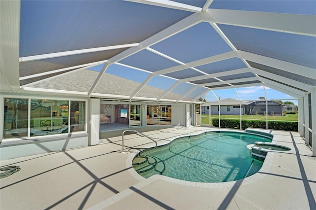 229 Sportsman Rd, Rotonda West, FL 33947 - view of swimming pool with a patio, a pool with connected hot tub, and a lanai
