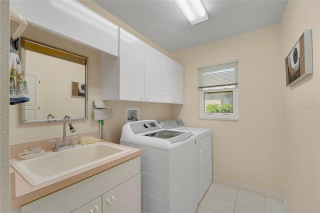 229 Sportsman Rd, Rotonda West, FL 33947 - clothes washing area with a sink, baseboards, cabinet space, and washer and dryer