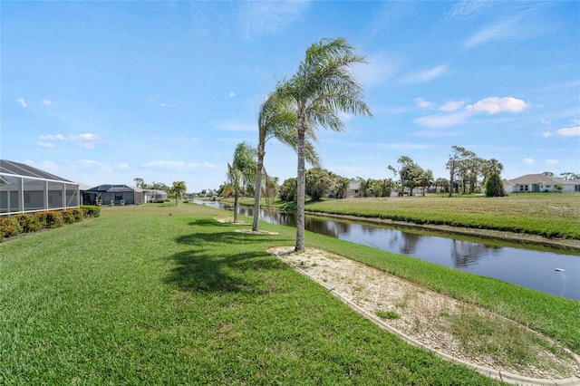 229 Sportsman Rd, Rotonda West, FL 33947 - exterior space with a lawn and a water view