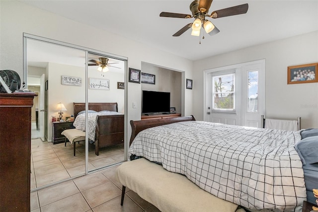 242 Seminole Blvd NW, Port Charlotte, FL 33952 - bedroom with a closet, ceiling fan, and light tile patterned flooring