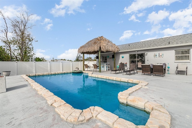 242 Seminole Blvd NW, Port Charlotte, FL 33952 - view of pool with fence, a fenced in pool, and a patio
