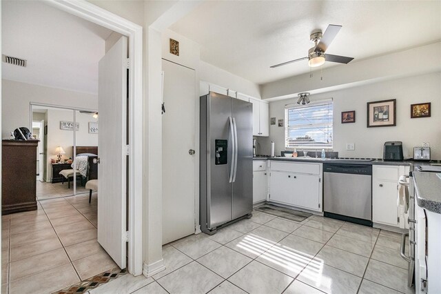 242 Seminole Blvd NW, Port Charlotte, FL 33952 - kitchen featuring visible vents, ceiling fan, light tile patterned floors, and stainless steel appliances