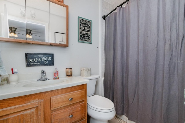 242 Seminole Blvd NW, Port Charlotte, FL 33952 - bathroom with toilet, a ceiling fan, vanity, and a shower with curtain