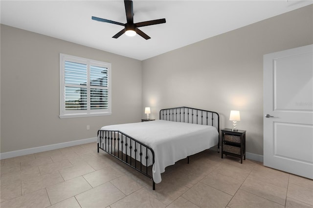 2229 Wakefield St, Port Charlotte, FL 33948 - bedroom with baseboards, light tile patterned floors, and a ceiling fan