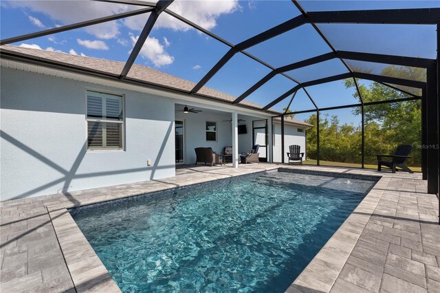 2229 Wakefield St, Port Charlotte, FL 33948 - swimming pool with a ceiling fan, a patio area, and glass enclosure