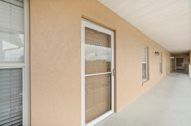 175 Kings Hwy Unit B21522, Punta Gorda, FL 33983 - doorway to property featuring stucco siding