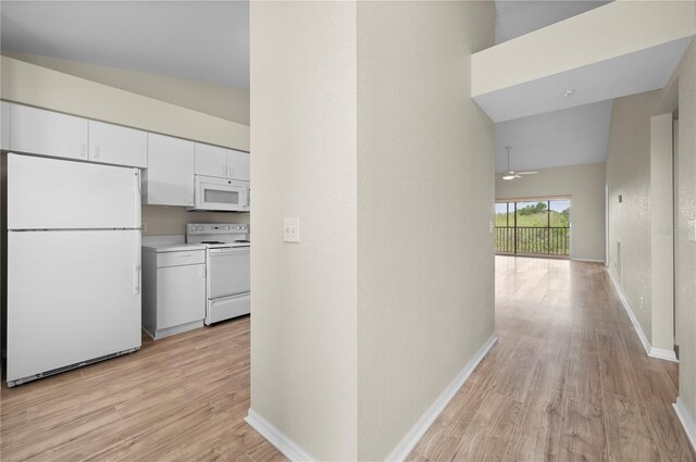 175 Kings Hwy Unit B21522, Punta Gorda, FL 33983 - corridor featuring light wood-style flooring and baseboards