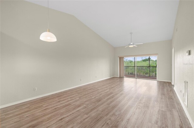 175 Kings Hwy Unit B21522, Punta Gorda, FL 33983 - empty room featuring visible vents, light wood-style flooring, high vaulted ceiling, and a ceiling fan