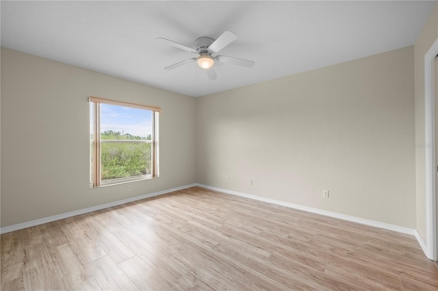 175 Kings Hwy Unit B21522, Punta Gorda, FL 33983 - empty room with light wood-type flooring, a ceiling fan, and baseboards