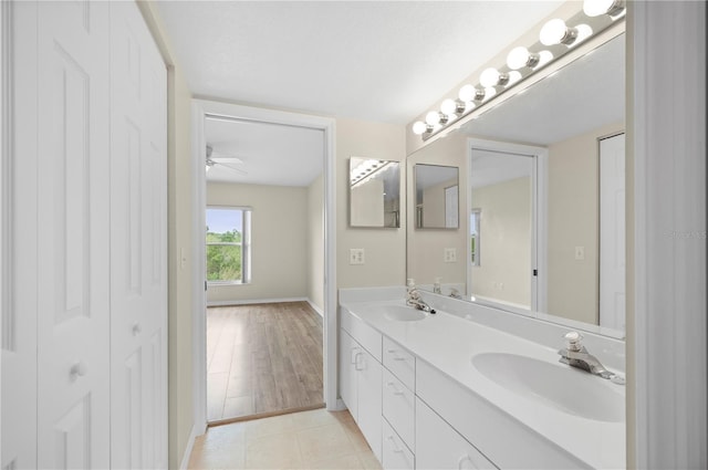 175 Kings Hwy Unit B21522, Punta Gorda, FL 33983 - bathroom with a sink, double vanity, tile patterned flooring, and a ceiling fan