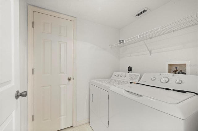 175 Kings Hwy Unit B21522, Punta Gorda, FL 33983 - clothes washing area with visible vents, independent washer and dryer, and laundry area