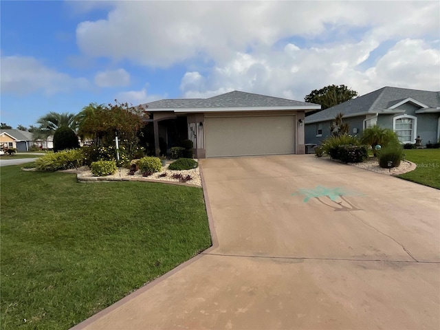 1536 Willow Dl, Sebring, FL 33872 - view of front of home featuring a front yard, an attached garage, driveway, and stucco siding