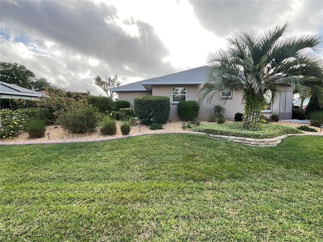 1536 Willow Dl, Sebring, FL 33872 - exterior space featuring stucco siding and a lawn