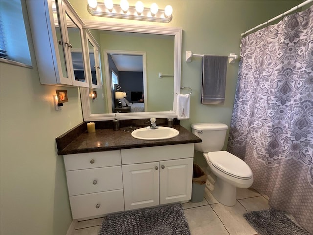 1536 Willow Dl, Sebring, FL 33872 - bathroom featuring tile patterned floors, toilet, curtained shower, and vanity