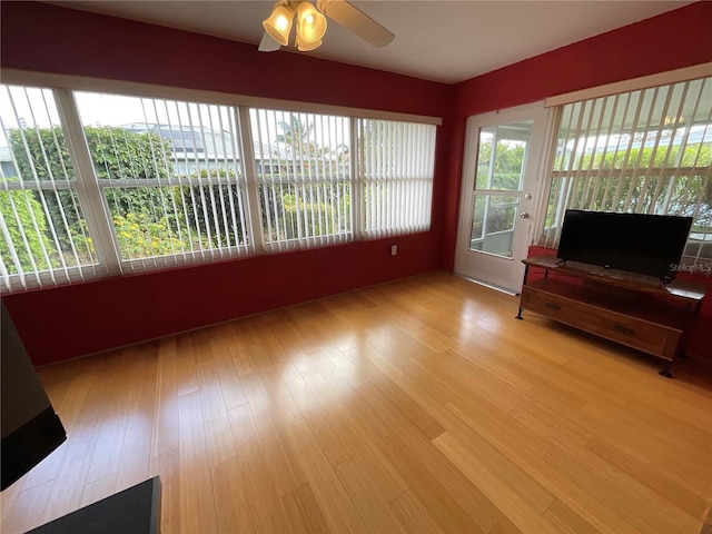 1536 Willow Dl, Sebring, FL 33872 - unfurnished living room with light wood-type flooring and a ceiling fan