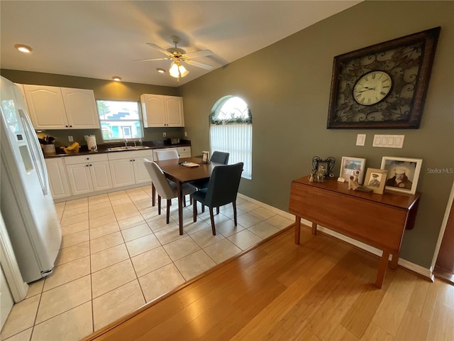 1536 Willow Dl, Sebring, FL 33872 - dining space with light wood-style floors, ceiling fan, and baseboards