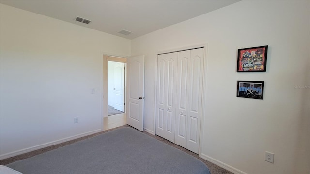 26456 View Dr, Punta Gorda, FL 33983 - unfurnished bedroom featuring carpet flooring and a closet