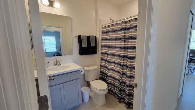 26456 View Dr, Punta Gorda, FL 33983 - bathroom featuring tile patterned floors, vanity, healthy amount of natural light, and a shower with shower curtain