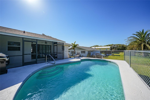 2621 Larkspur Dr, Punta Gorda, FL 33950 - view of pool featuring a fenced in pool, a patio, grilling area, a fenced backyard, and a sunroom