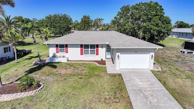 2621 Larkspur Dr, Punta Gorda, FL 33950 - single story home featuring a shingled roof, a garage, concrete driveway, a front lawn, and stucco siding