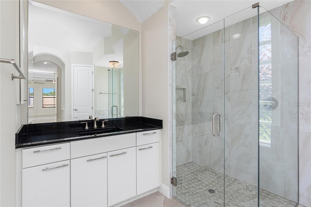 full bath featuring a shower stall and vanity