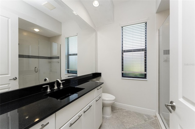 bathroom with visible vents, baseboards, toilet, a shower stall, and vanity