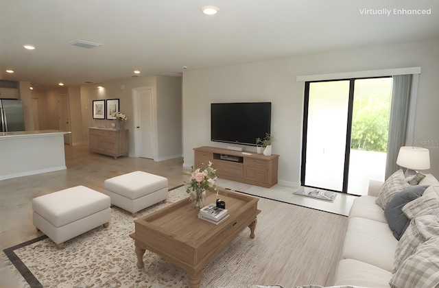 17374 Gadsen Ave, Port Charlotte, FL 33948 - living area featuring recessed lighting and baseboards